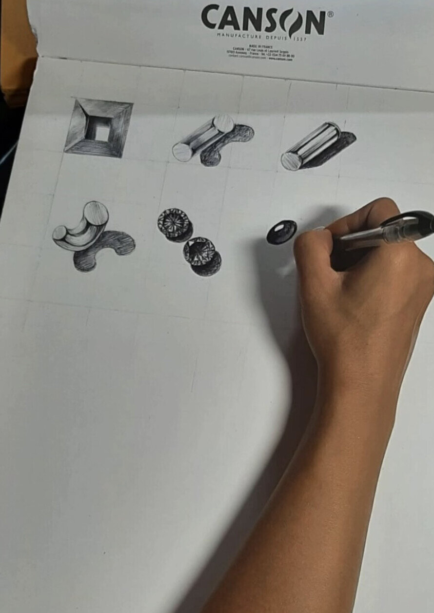 Hand-drawn gemstone studies in a sketchbook